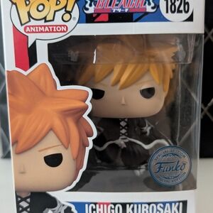 Funko Pop Animation Figure with Orange Hair and Black Outfit